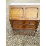 An early 20th century oak bureau