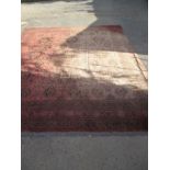 A large vintage wool floor rug