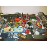 A large quantity of vintage die-cast vehicles to include a rocket launcher