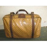 A vintage Gucci travel bag