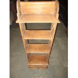 A shelved wall unit with single drawer base