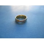 An 18ct yellow and white gold ring, approx. weight 6.4g