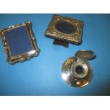 A sterling silver capstan ink well and 2 silver picture frames