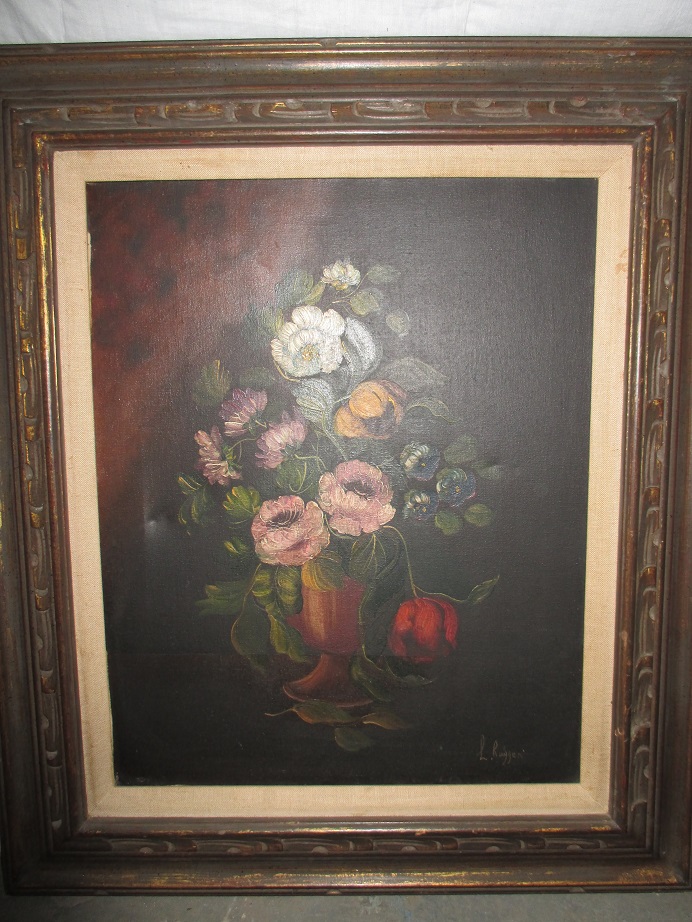 A still life floral oil on canvas, signed l/r, purchased in America in the 1960s