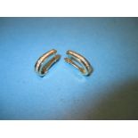 A pair of 18ct yellow gold diamond hoop earrings