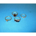 Three 9ct gold rings and a 14ct example