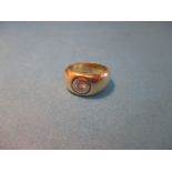 An Egyptian gold ring set with solitaire diamond, Ring size I approx. weight 7g