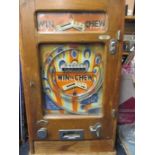 A vintage Allwins win & Chew slot machine