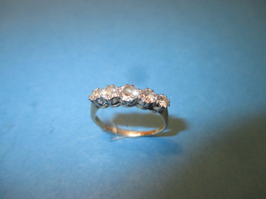 A 5 stone diamond half hoop eternity ring, approx. size M