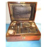 A 19th century brass bound travelling vanity/writing box with fitted interior