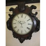 A 19th century carved oak wall clock case with later movement