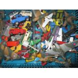 A quantity of vintage die-cast vehicles