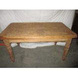 An antique pine country house kitchen table