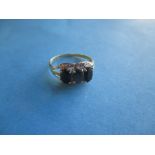 A 9ct gold and 3 stone sapphire ring, approx. ring size O