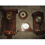 Two vintage wall clocks a mantle clock and a barometer