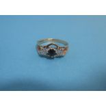 A 9ct gold diamond and sapphire ring, approx. size P