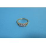 An 18ct gold 3 stone diamond ring, approx. size O