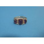 A 9ct gold seed pearl and amethyst ring, approx. size O