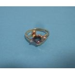 An 18ct gold ring set with mystic topaz, approx. size N 1/2