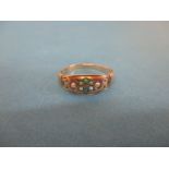 A 9ct gold ring with turquoise and seed pearl, approx. size P ½