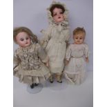 3 Early 20th century dolls in period costumes