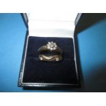 A 9ct gold wedding and engagement ring set, approx. size M