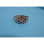 A 9ct gold dress ring with a small central diamond, approx. size P1/2