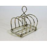 A silver wire toast rack