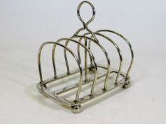 A silver wire toast rack