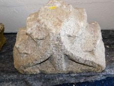 A piece of carved 15th/16thC. granite formerly own