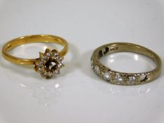 Two 18ct diamond rings, both lacking one stone 6.3