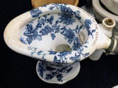 A Victorian G.Jennings The Closet Of The Century blue & white transferware ceramic toilet
