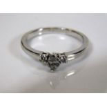 An 18ct white gold ring 3.9g with diamonds approx. 0.3cts