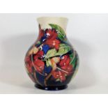 A Moorcroft pottery vase approx. 9.5in of floral d