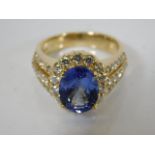 A large 14ct gold diamond & tanzanite ring