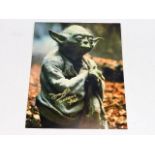 A hand signed Deep Roy photograph on Star Wars set
