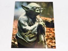 A hand signed Deep Roy photograph on Star Wars set