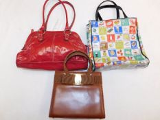 A brown Salvatore Ferragamo bag & two others