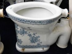A Victorian Stafordshire ceramic toilet with external blue & white transferware decor, crack to base