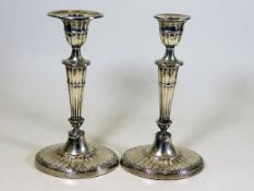 A pair of early 19thC. silver candlesticks lacking