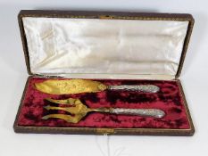 A boxed set of silver & gilt French fish servers