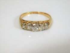 An 18ct gold five stone old cut diamond ring appro