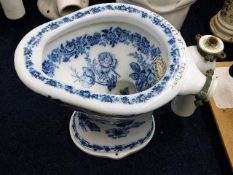 A Victorian G.Jennings The Closet Of The Century blue & white transferware ceramic toilet, crack to