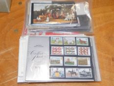 A quantity of mint stamps, first day covers & pres