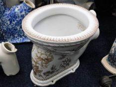 An 19thC. brown transferware ceramic toilet Waterfall Closet