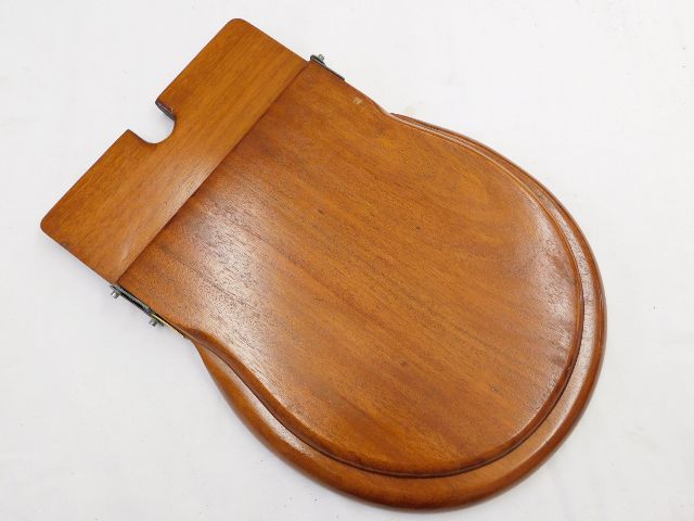 A refurbished Victorian mahogany toilet seat