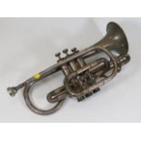 A vintage Besson white metal cornet