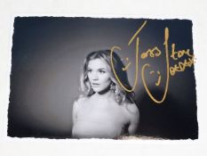 A hand signed Joss Stone photograph as acquired by