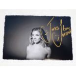 A hand signed Joss Stone photograph as acquired by