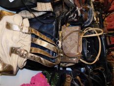 A collection of ten handbags